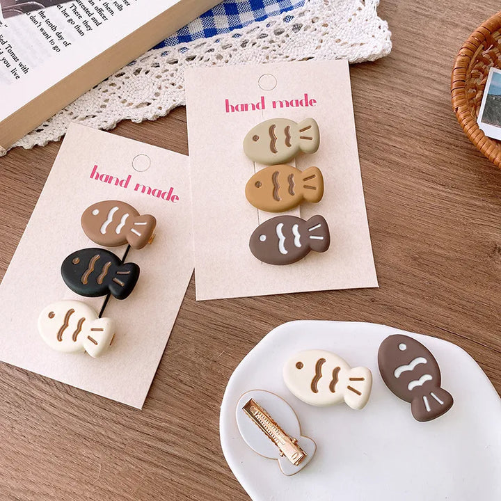 Tan S/3 Fish Hair Clips
