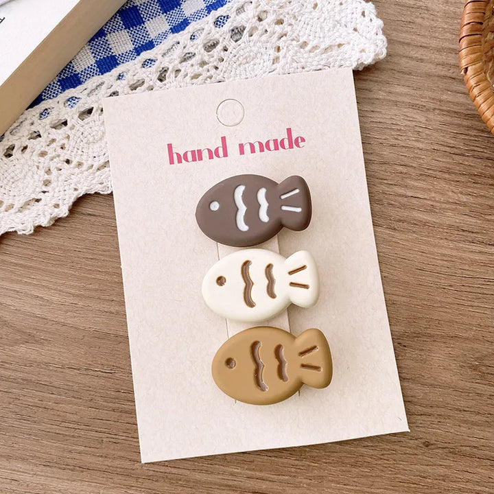 Tan S/3 Fish Hair Clips