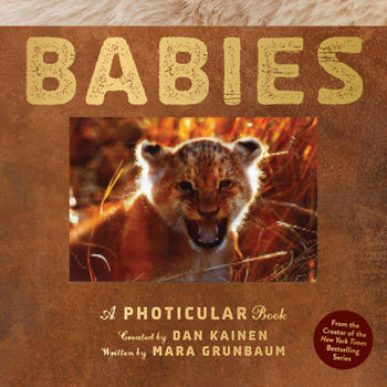Book cover of 'BABIES' featuring a lion cub on a brown background