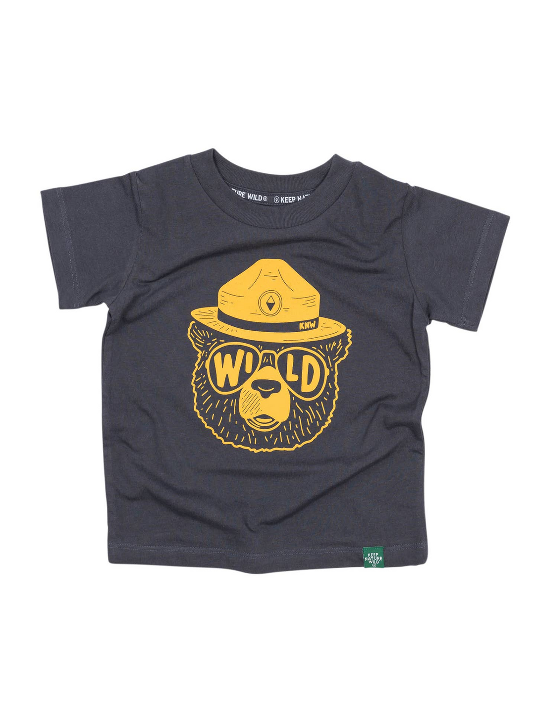 A toddler's dark charcoal gray t-shirt featuring a yellow graphic of a bear wearing a ranger hat with 'WILD' written on its sunglasses. The shirt is laid flat against a solid white background.