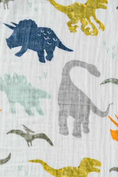little unicorn dino friends swaddle